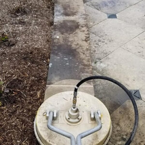 Photo of concrete pavers being hot washed