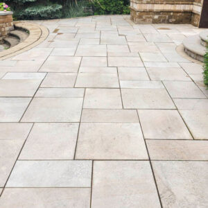 Photo of a stone paver patio after being power washed