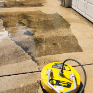 Photo of a clean and bright driveway after power washing