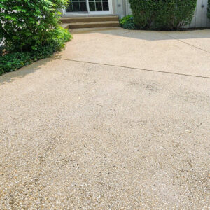 Photo of a concrete patio after being power washed